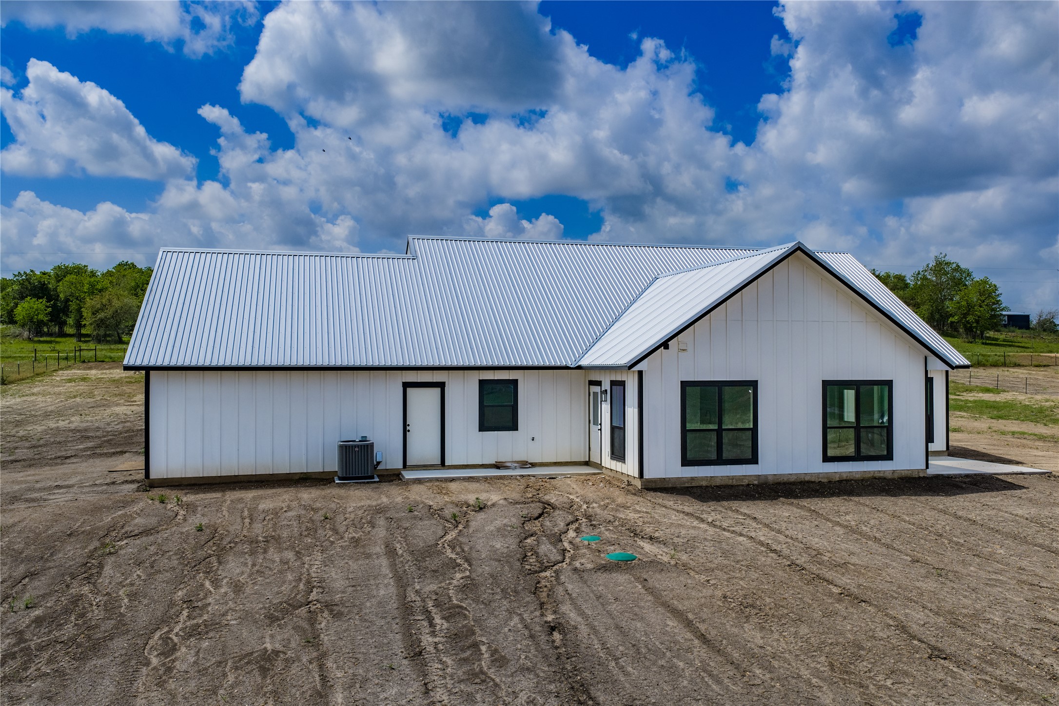 9391 Hajovsky Road La Grange, TX 78945 - Photo 15 of 22 a view of a house with a yard