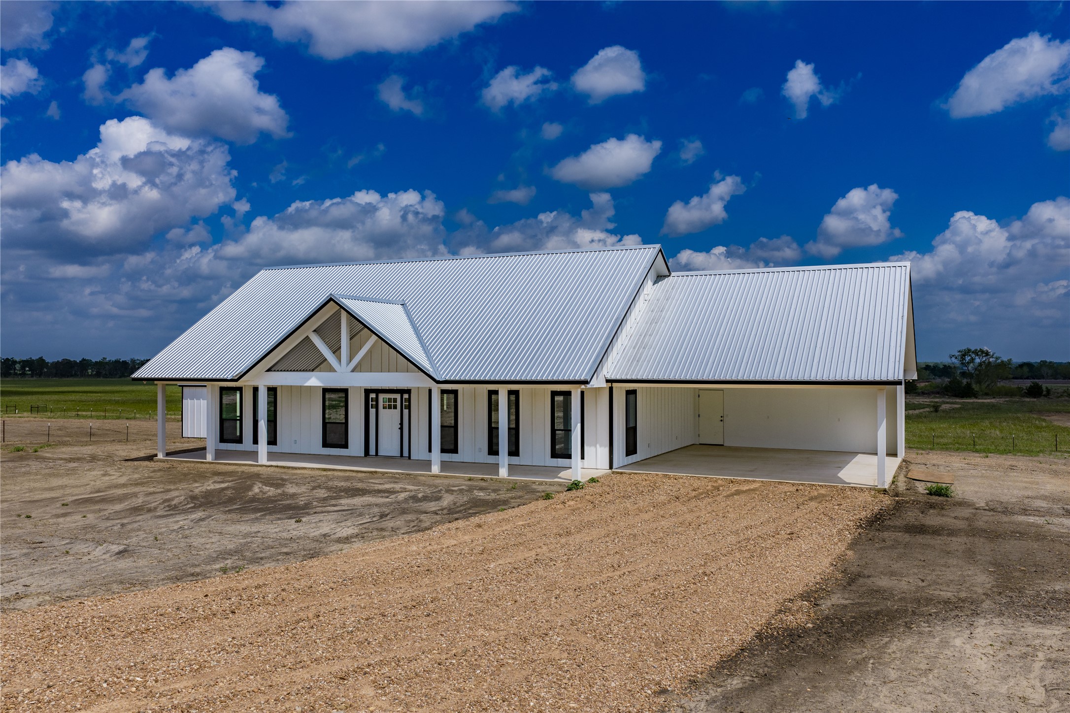 9391 Hajovsky Road La Grange, TX 78945 - Photo 21 of 22 front view of a house with a yard
