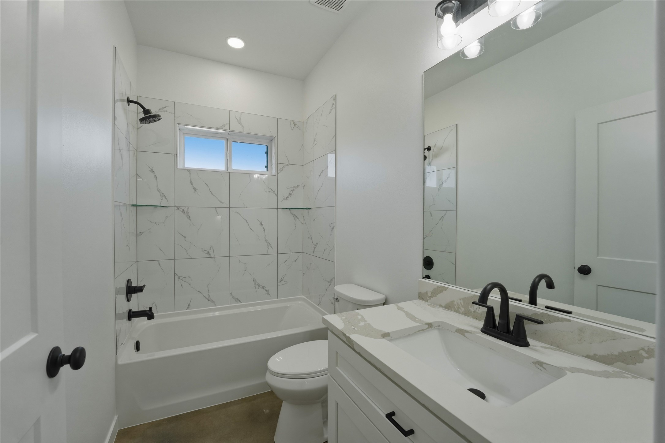 9391 Hajovsky Road La Grange, TX 78945 - Photo 9 of 22 a bathroom with a sink a toilet and shower