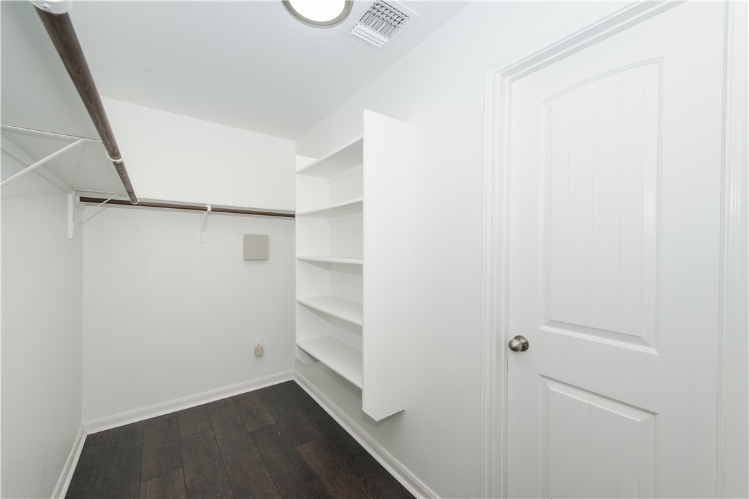 1007 Plateau Trail Georgetown, TX 78626 - Photo 18 of 32 a view of an empty walk in closet