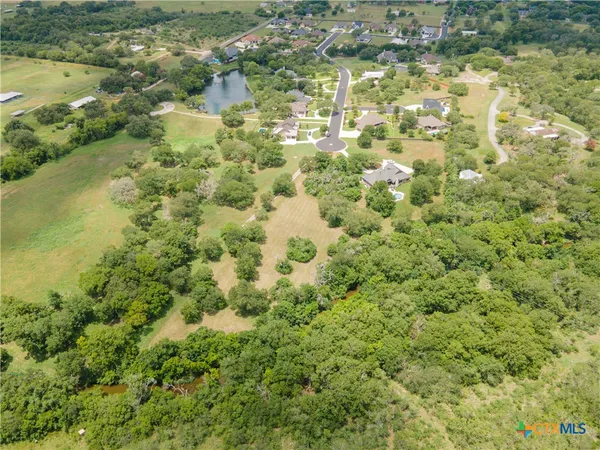 a view of a lake with a house