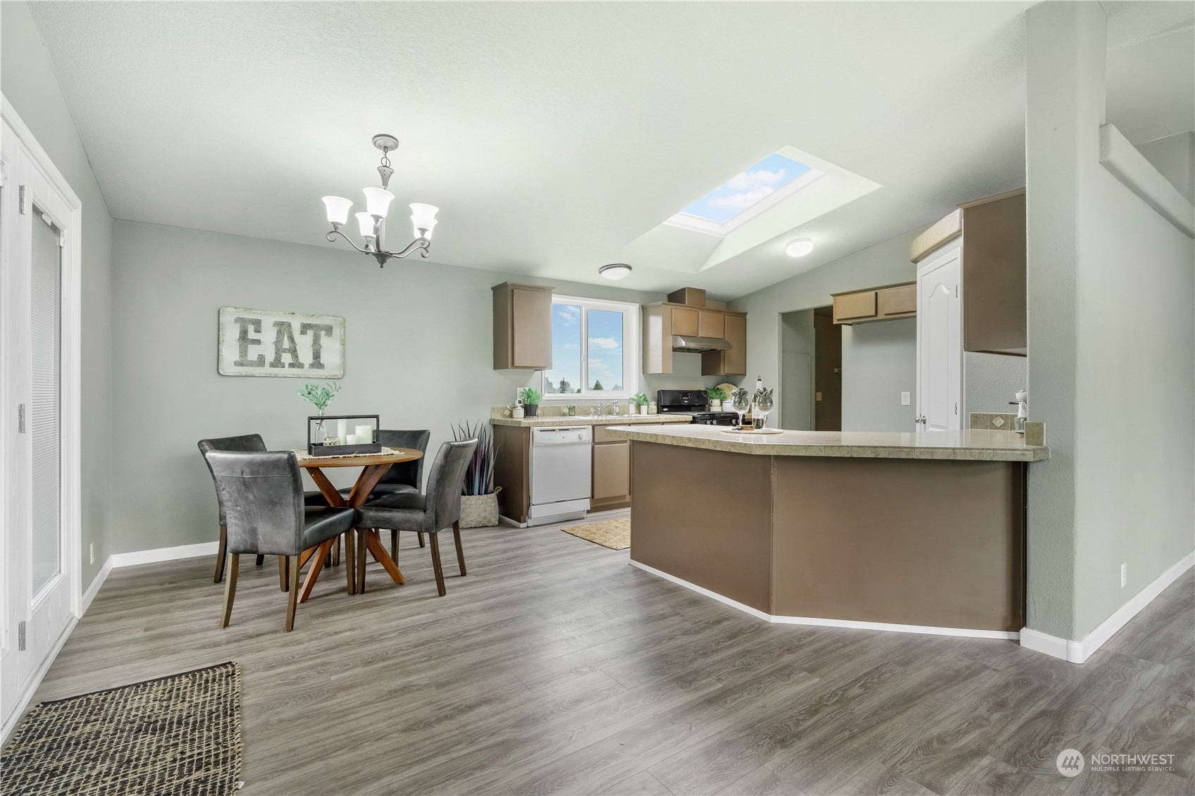 3796 Lindsay Road Everson, WA 98247 - Photo 6 of 37 a view of a dining room with furniture and wooden floor