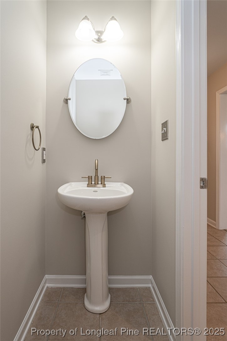 273 St George Drive Raeford, NC 28376 - Photo 17 of 38 a bathroom with a sink