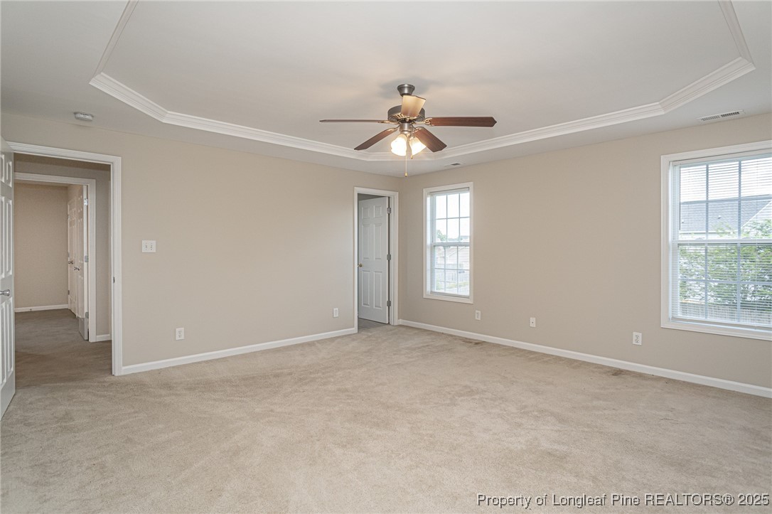 273 St George Drive Raeford, NC 28376 - Photo 19 of 38 an empty room with windows and fan