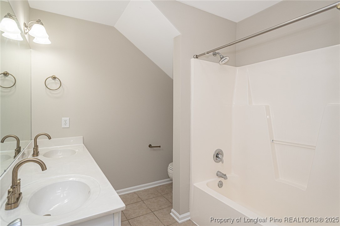 273 St George Drive Raeford, NC 28376 - Photo 28 of 38 a bathroom with a sink and shower