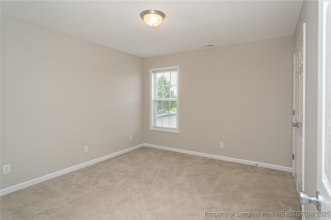 273 St George Drive Raeford, NC 28376 - Photo 29 of 38 an empty room with a window