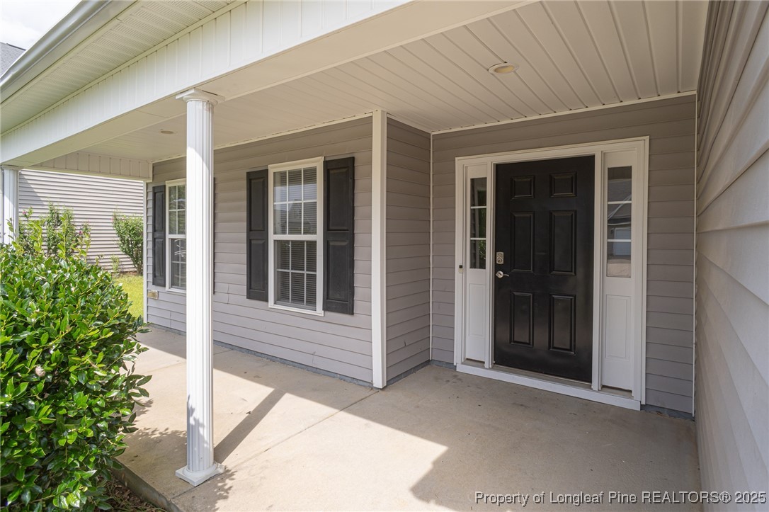 273 St George Drive Raeford, NC 28376 - Photo 3 of 38 front view of a house with a large window