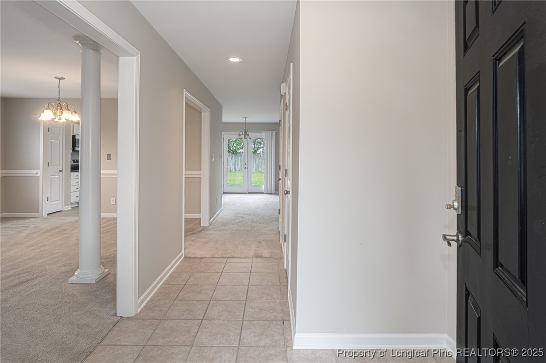 273 St George Drive Raeford, NC 28376 - Photo 4 of 38 a view of a hallway with closet and bathroom