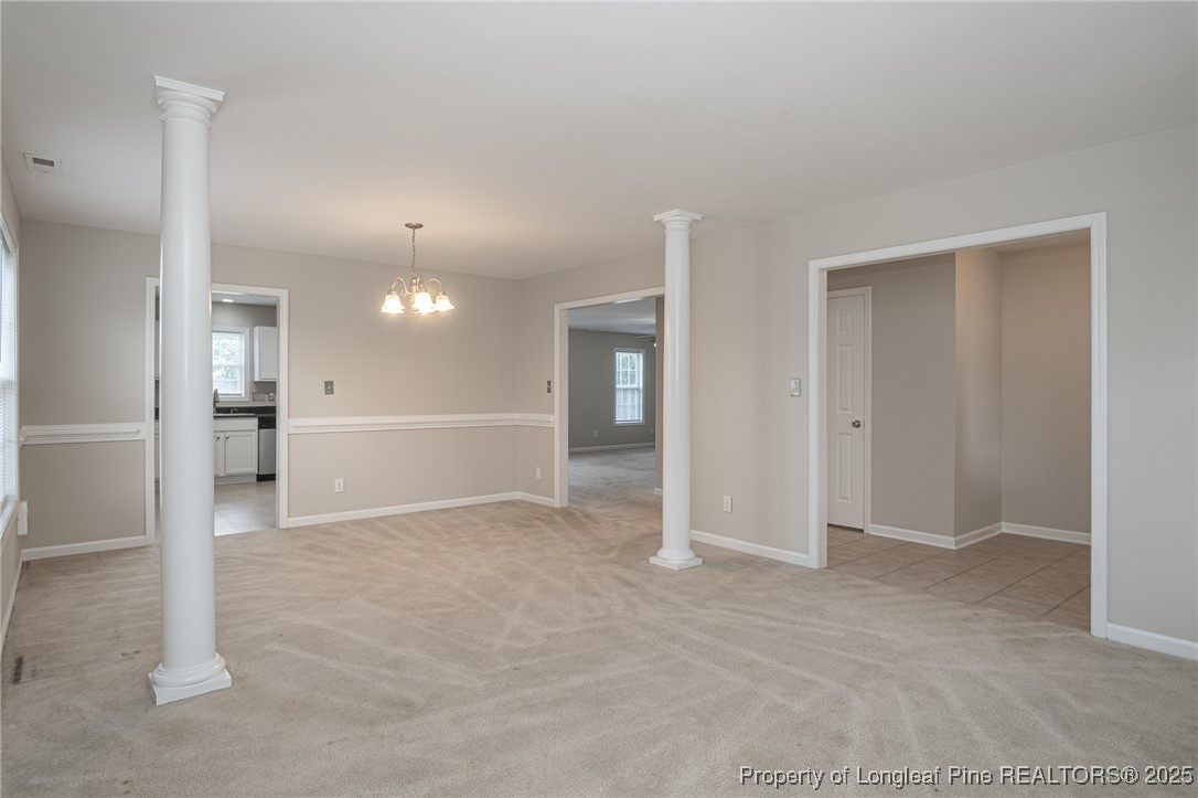 273 St George Drive Raeford, NC 28376 - Photo 5 of 38 a view of an empty room and kitchen view