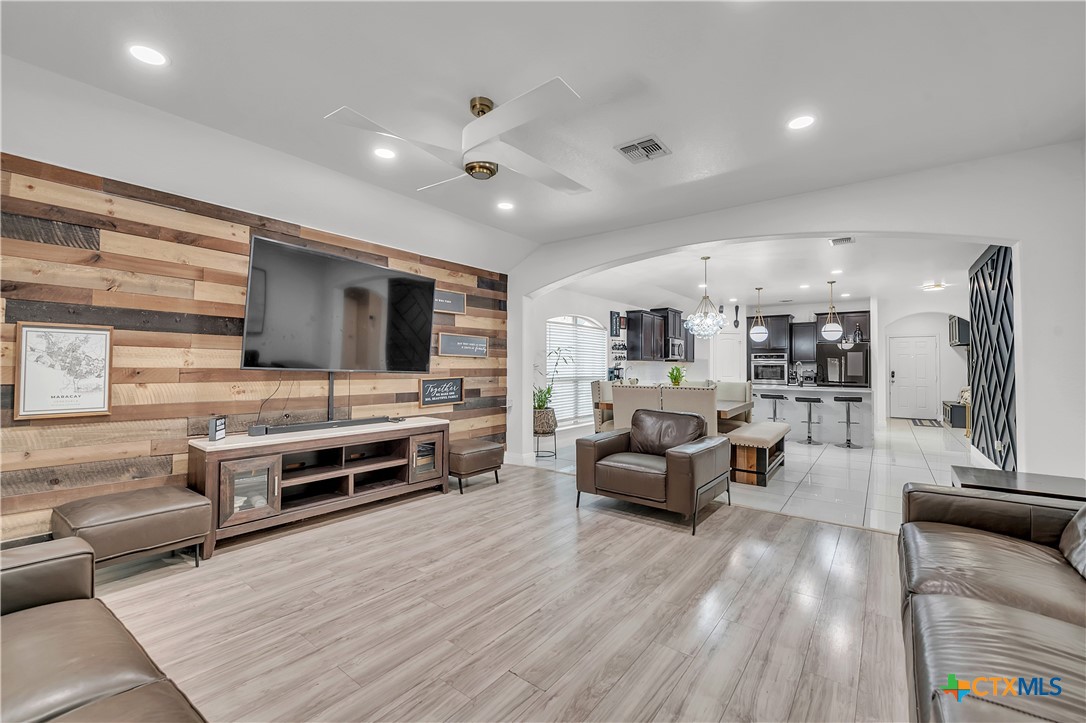 5577 Perdita Drive Belton, TX 76513 - Photo 10 of 25 a living room with furniture and flat screen tv