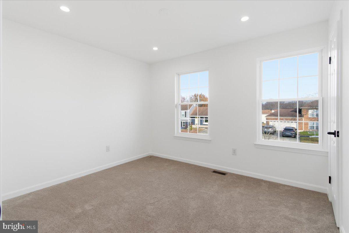 9409 Silver Fox Turn Clinton, MD 20735 - Photo 16 of 33 an empty room with a window