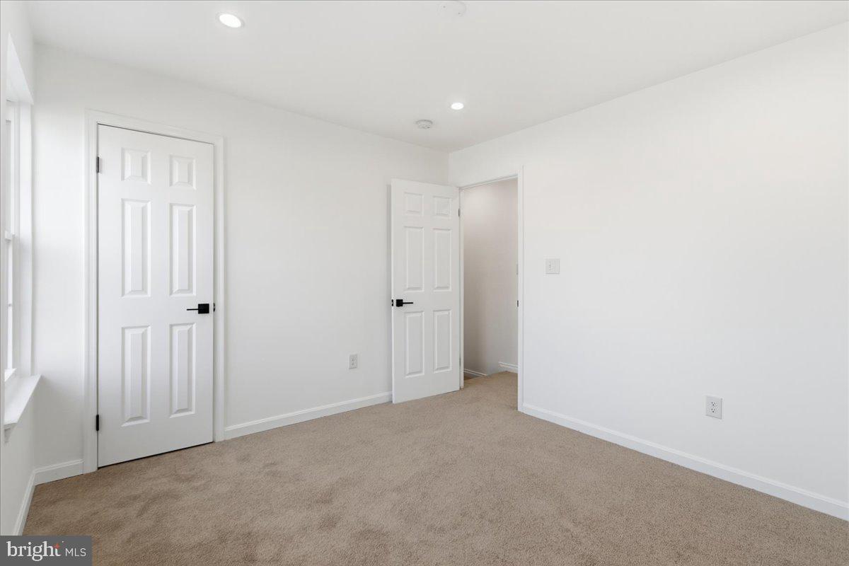 9409 Silver Fox Turn Clinton, MD 20735 - Photo 18 of 33 a view of an empty room