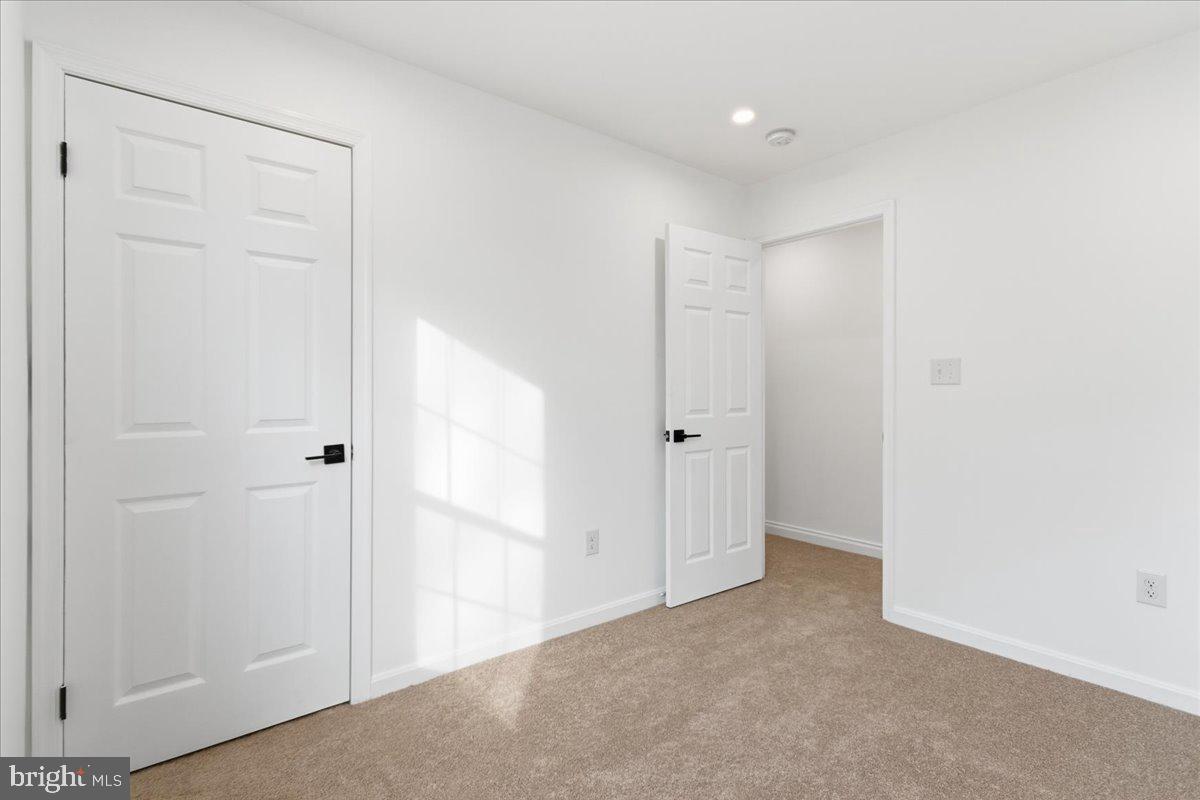 9409 Silver Fox Turn Clinton, MD 20735 - Photo 19 of 33 a view of an empty room