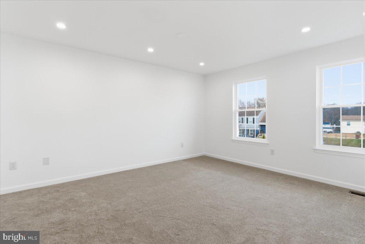 9409 Silver Fox Turn Clinton, MD 20735 - Photo 20 of 33 an empty room with windows