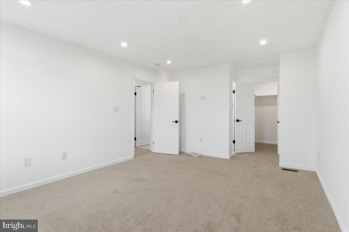 9409 Silver Fox Turn Clinton, MD 20735 - Photo 21 of 33 a view of an empty room