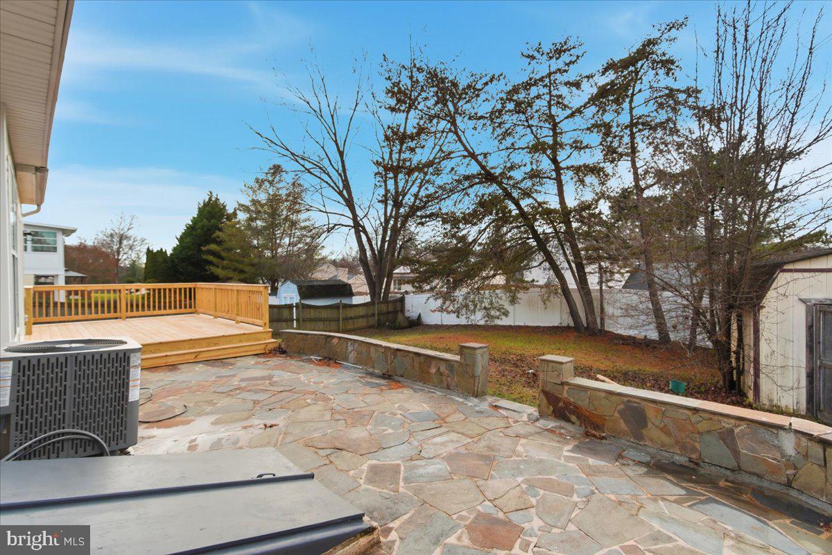 9409 Silver Fox Turn Clinton, MD 20735 - Photo 29 of 33 a view of a yard with wooden fence