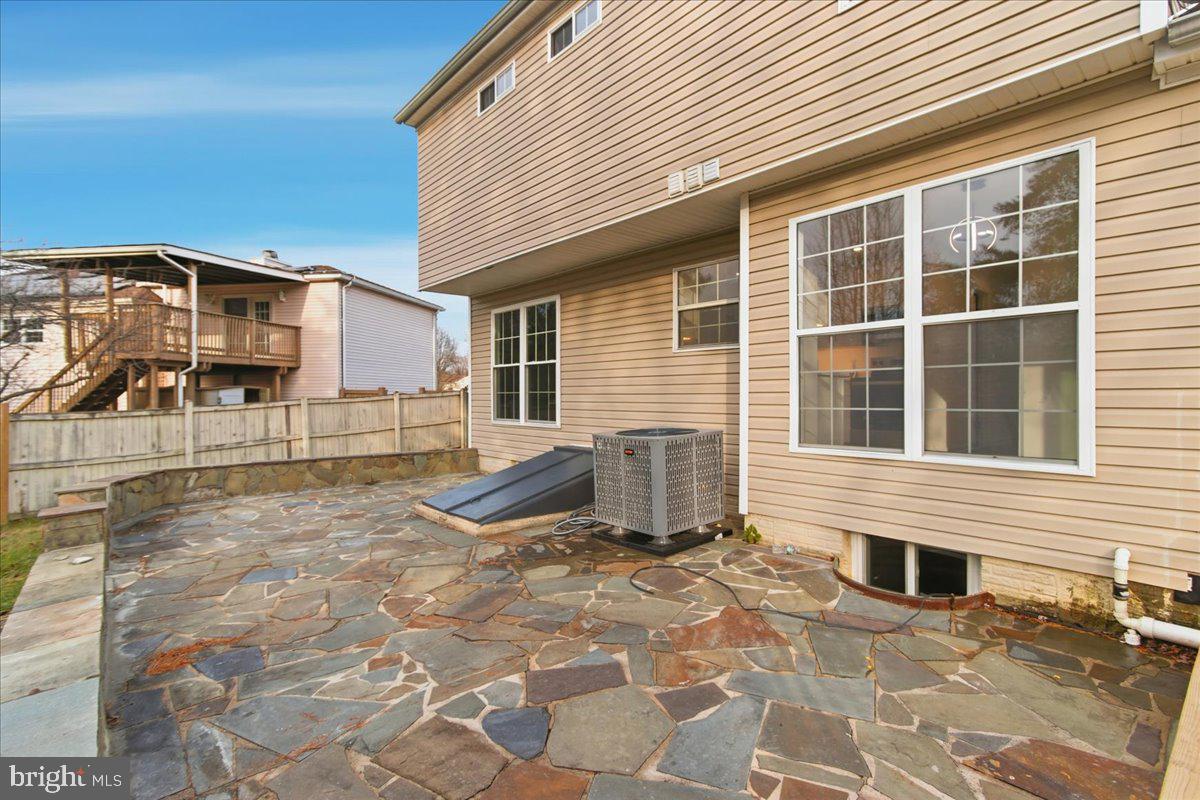 9409 Silver Fox Turn Clinton, MD 20735 - Photo 31 of 33 a view of a house with a patio