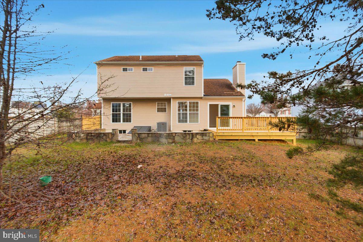 9409 Silver Fox Turn Clinton, MD 20735 - Photo 32 of 33 front view of a house with a small yard