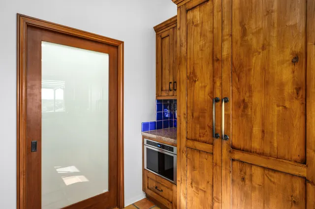 a view of hall way with furniture