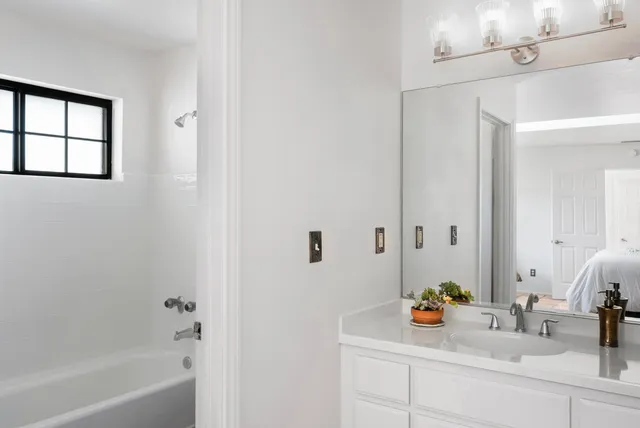 a close view of a bathtub in a bathroom