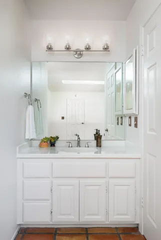 a view of a backyard with flowers and flowers