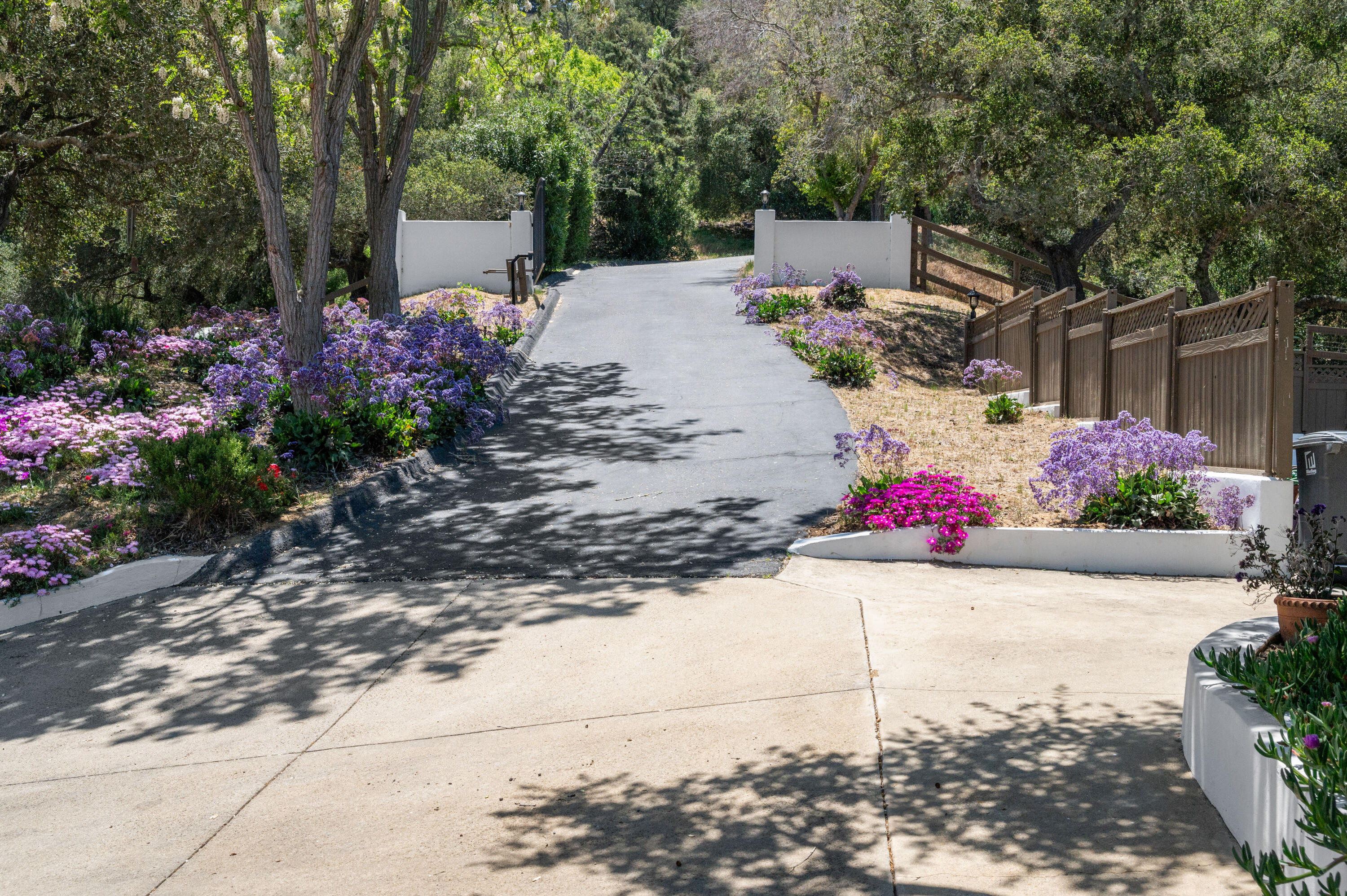 760 Falcon Ridge Lane Buellton, CA 93427 - Photo 30 of 51 a view of a backyard with flowers and flowers