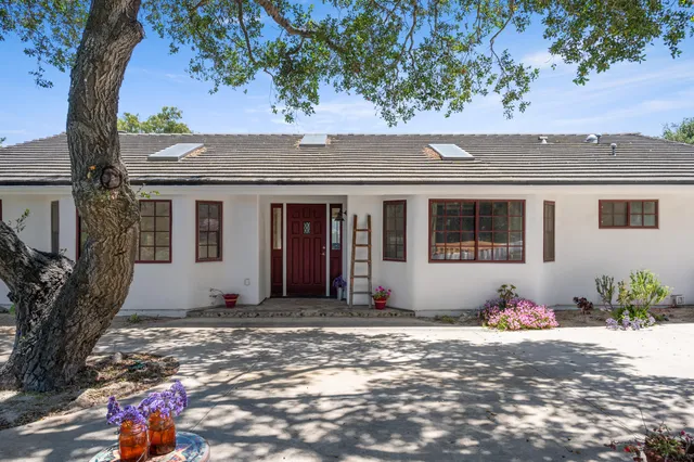 a view of a hallway with a glass door
