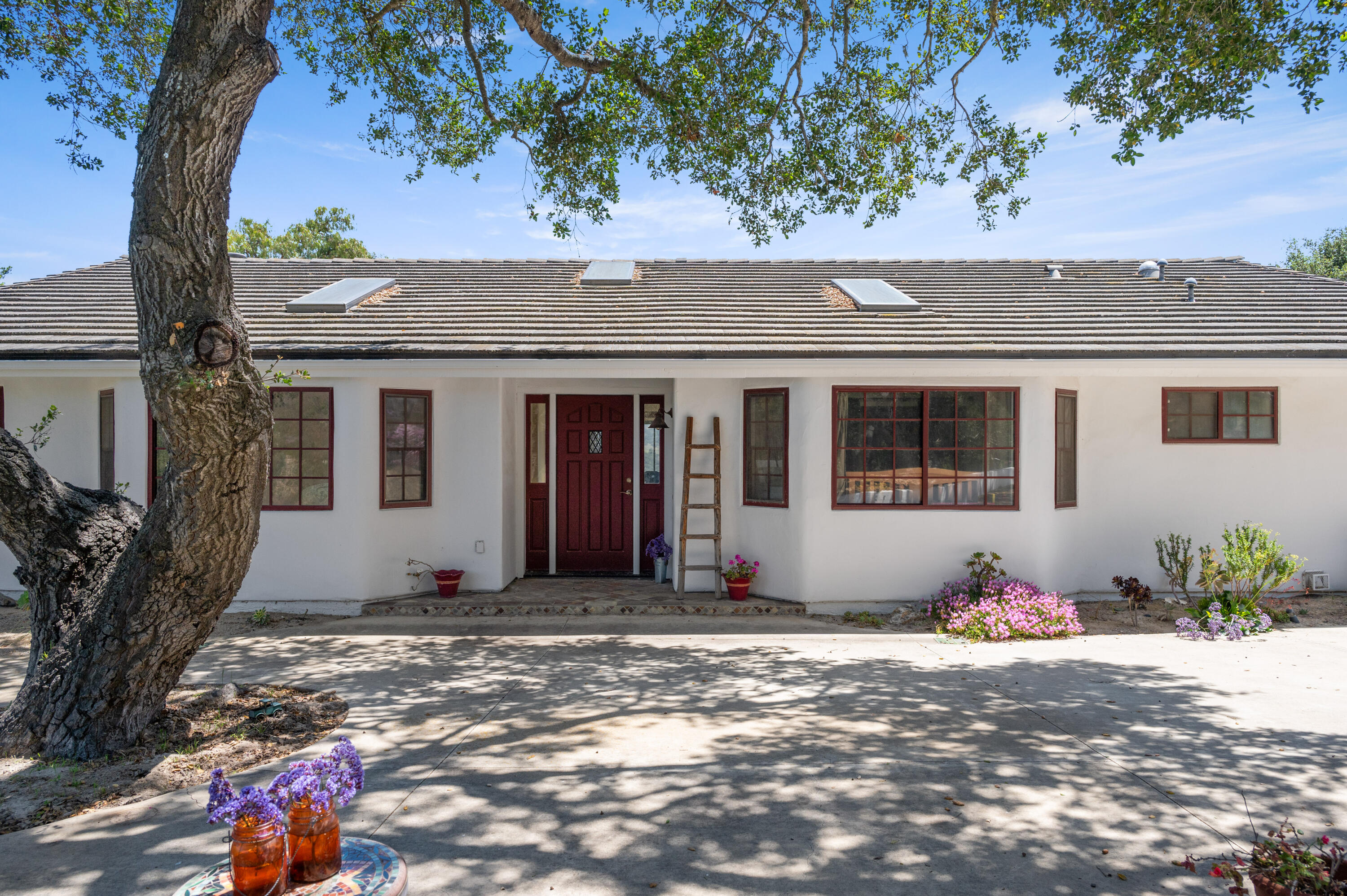 760 Falcon Ridge Lane Buellton, CA 93427 - Photo 4 of 51 a front view of a house with a yard