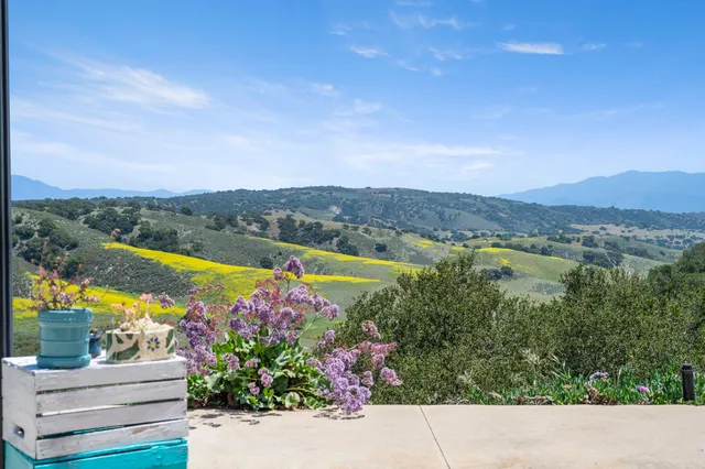 a view of a swimming pool with an outdoor space