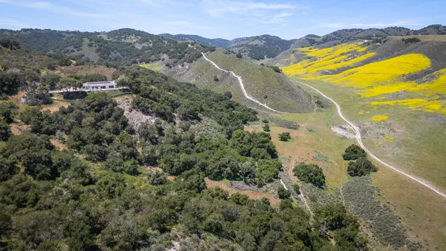 a view of an ocean and a mountain