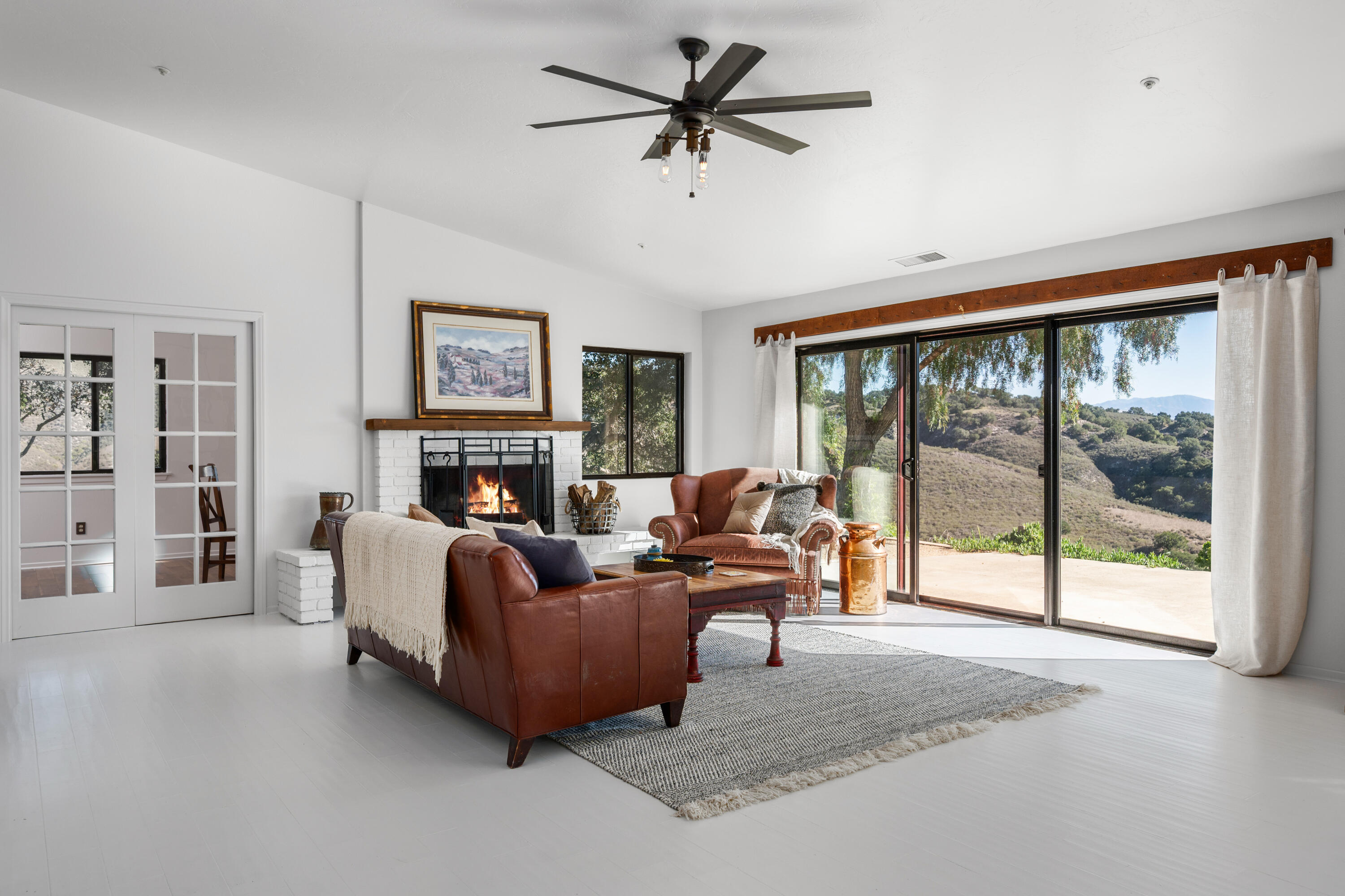 760 Falcon Ridge Lane Buellton, CA 93427 - Photo 7 of 51 a living room with furniture large window and flat screen tv