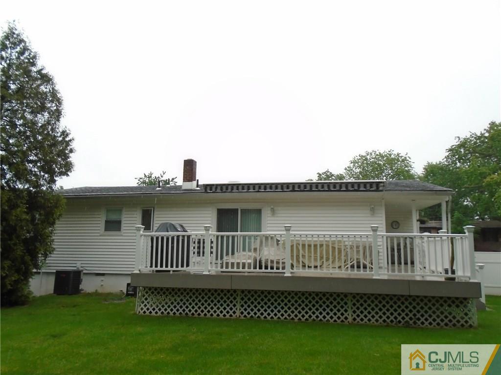 69 Harmon Road Edison, NJ 08837 - Photo 21 of 23 a view of a house with a roof deck