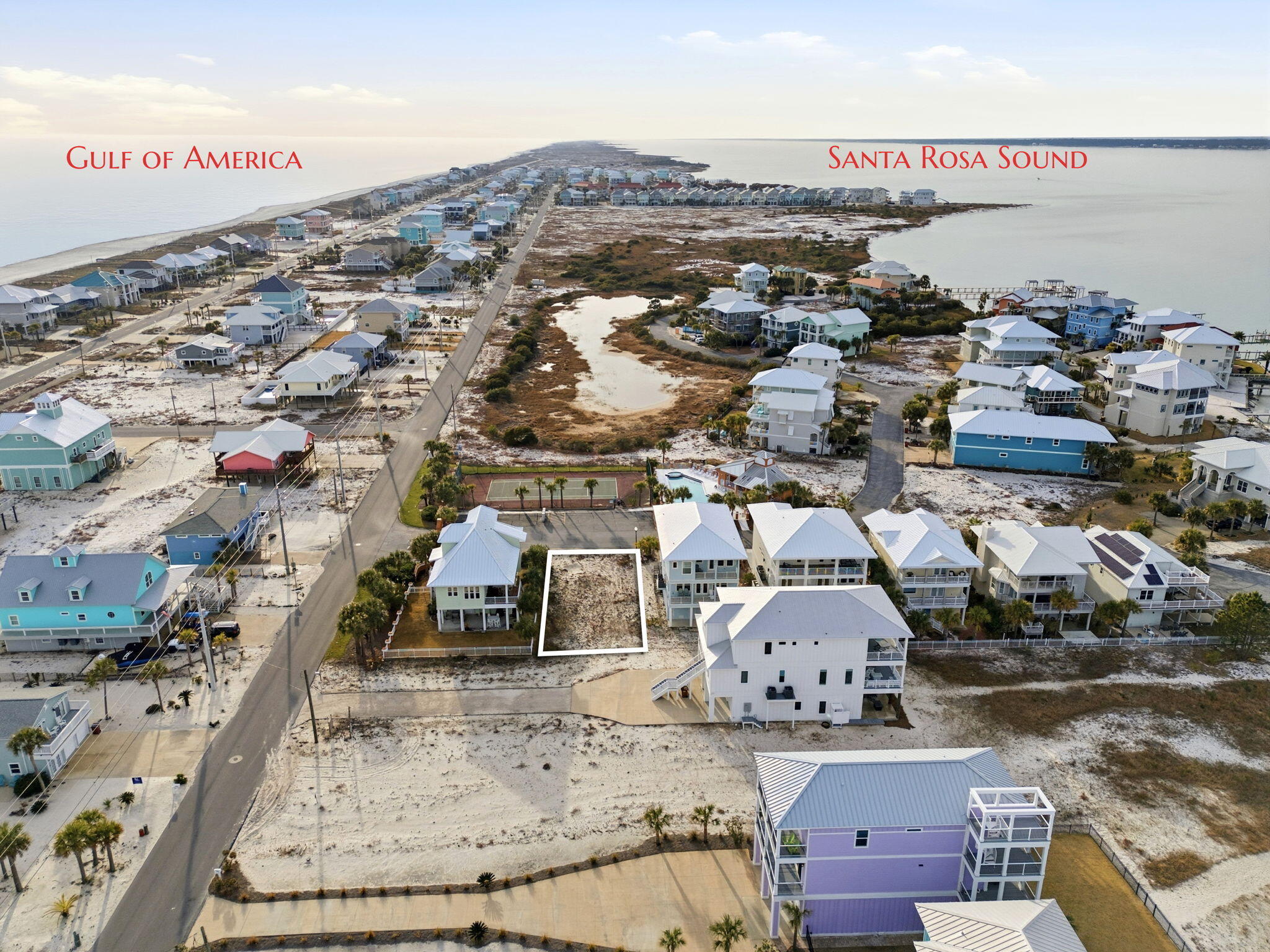 Lot 2 Bermuda Drive Navarre, FL 32566 - Photo 8 of 14 an aerial view of a house with a ocean