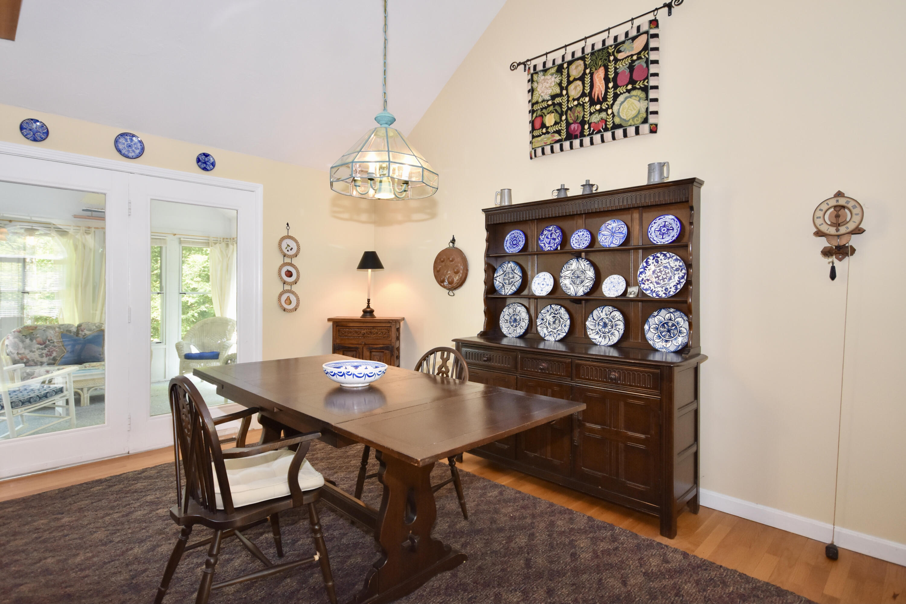 54 Snead Drive Mashpee, MA 02649 - Photo 14 of 32 a view of a dining room with furniture and wooden floor