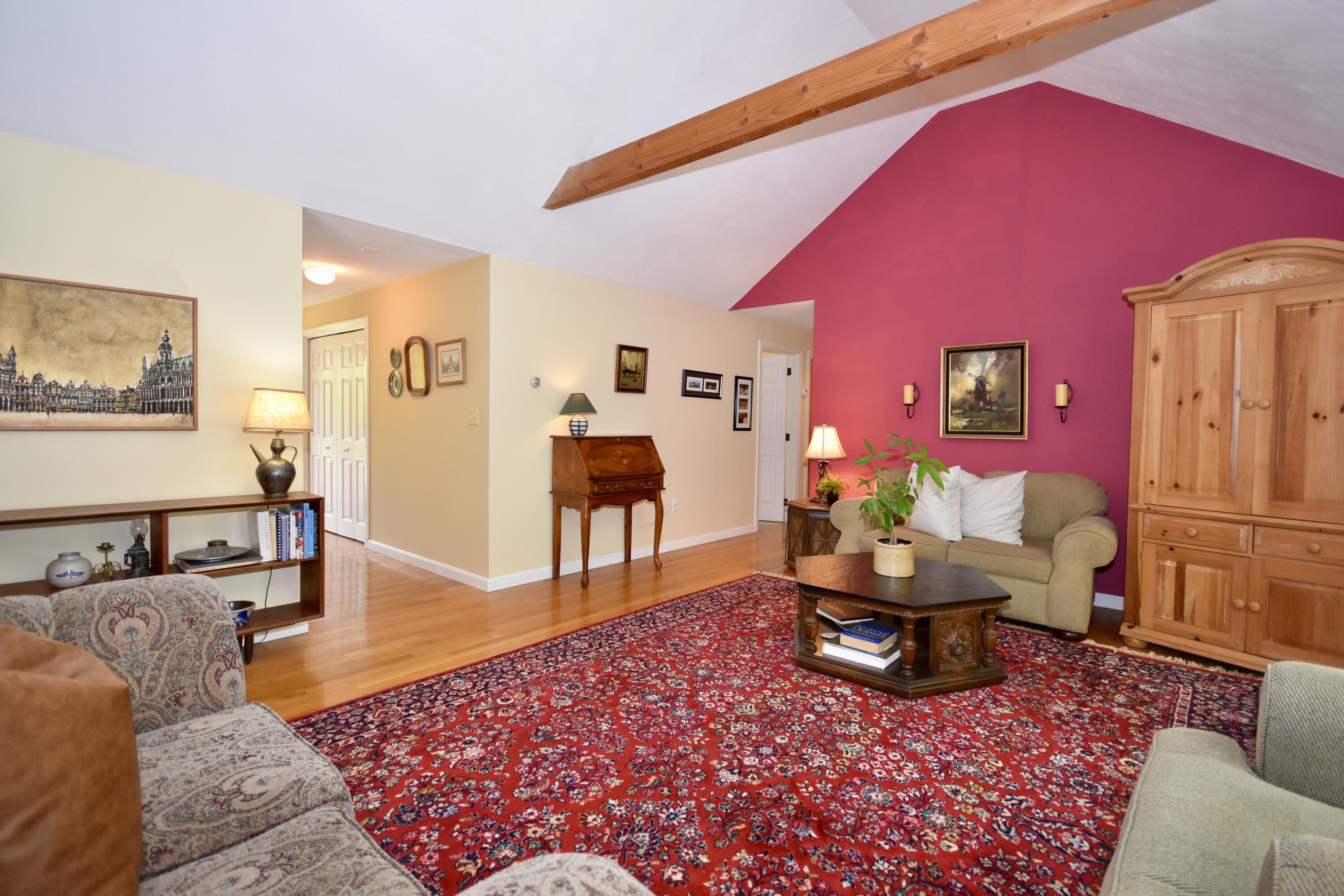 54 Snead Drive Mashpee, MA 02649 - Photo 16 of 32 a living room with furniture and wooden floor