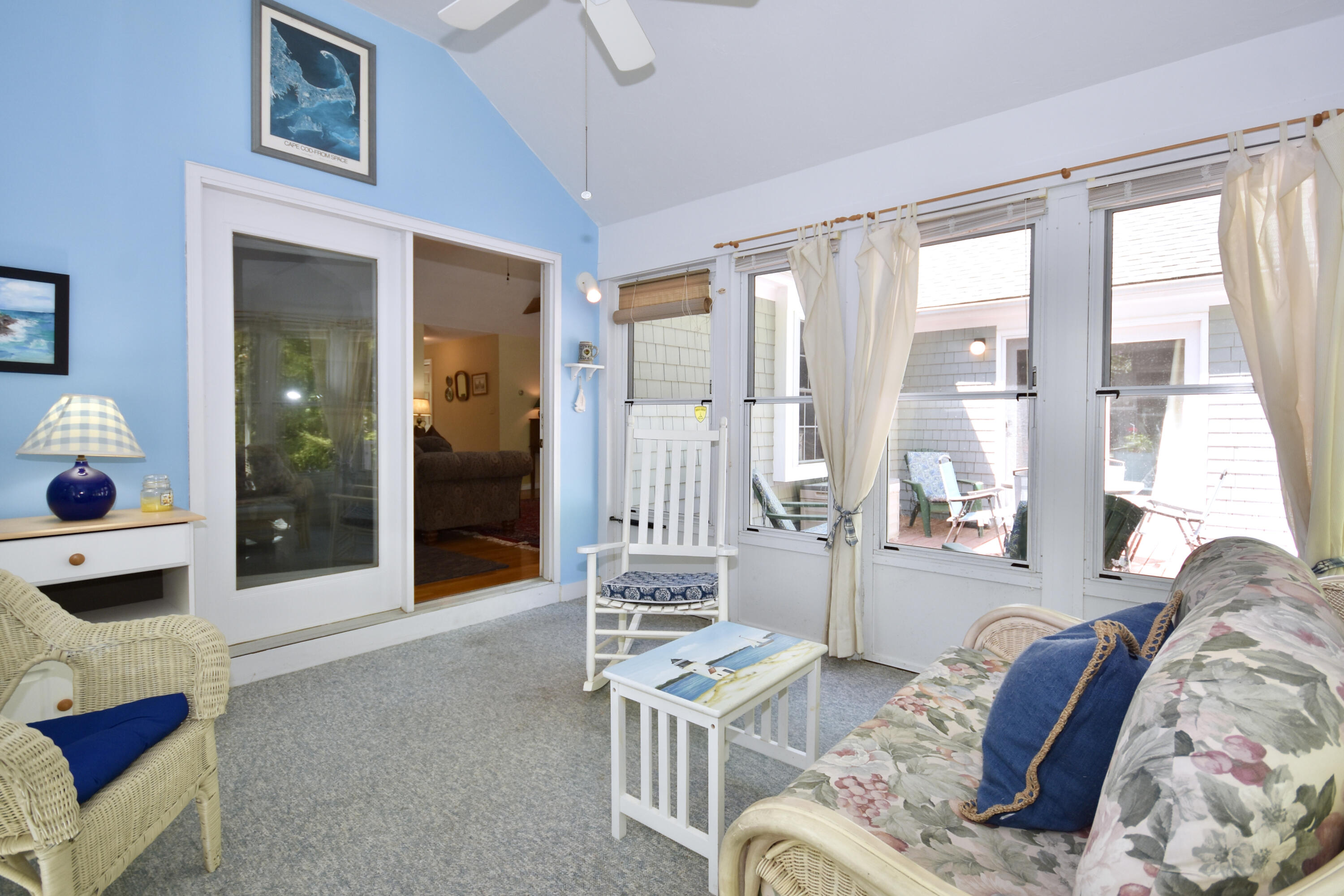 54 Snead Drive Mashpee, MA 02649 - Photo 18 of 32 a living room with furniture and large windows