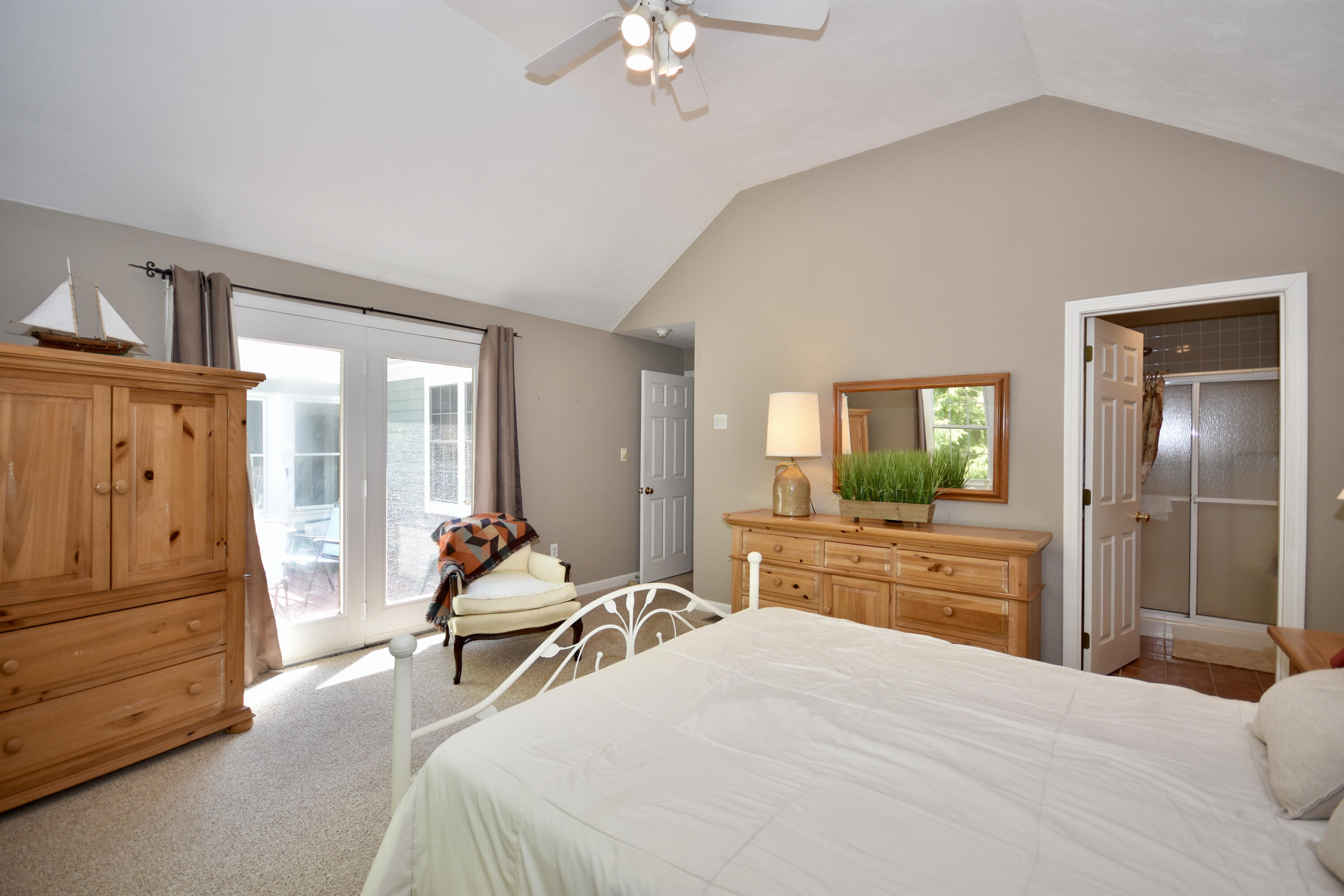 54 Snead Drive Mashpee, MA 02649 - Photo 20 of 32 a bedroom with furniture and wooden floor