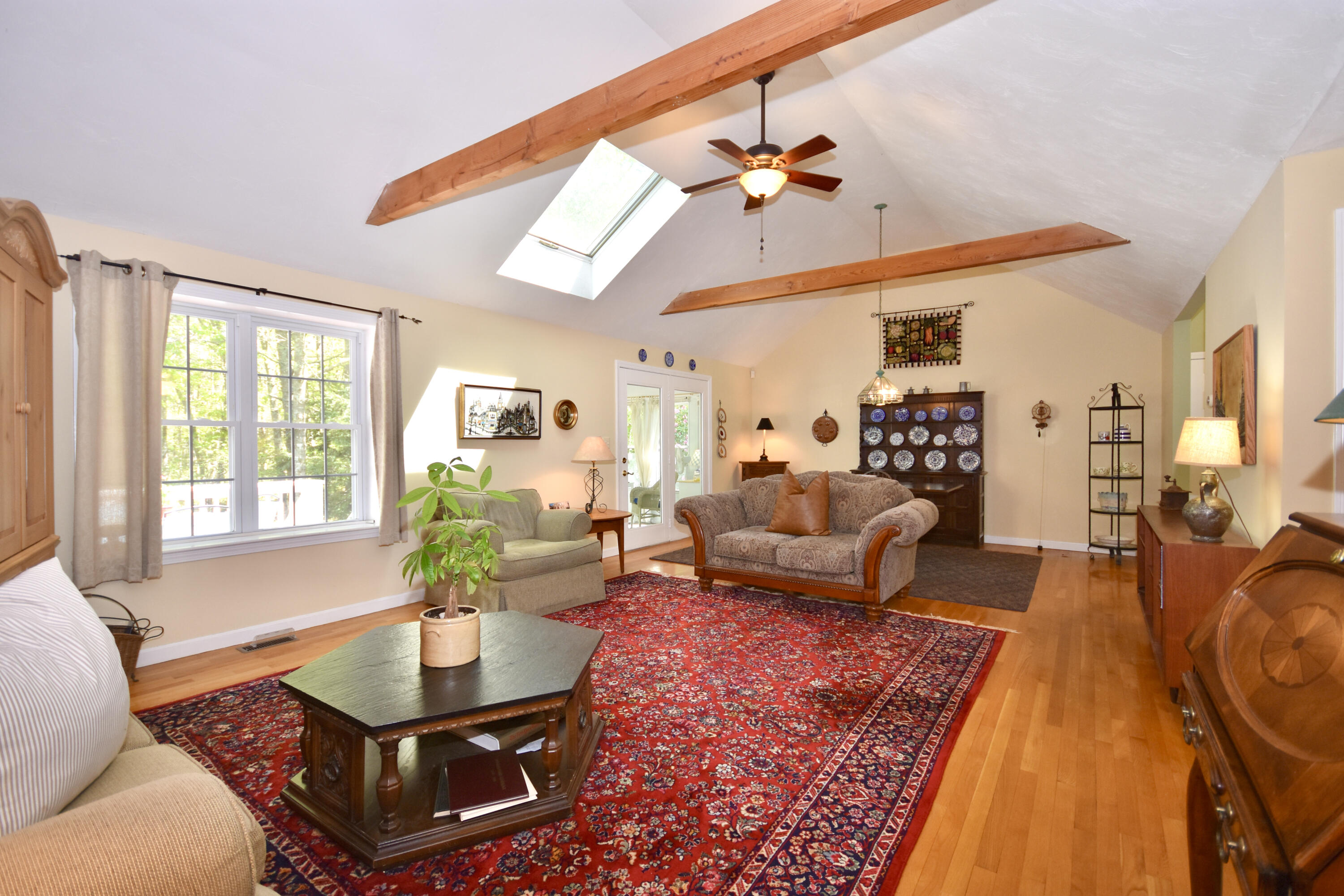 54 Snead Drive Mashpee, MA 02649 - Photo 23 of 32 a living room with furniture and wooden floor