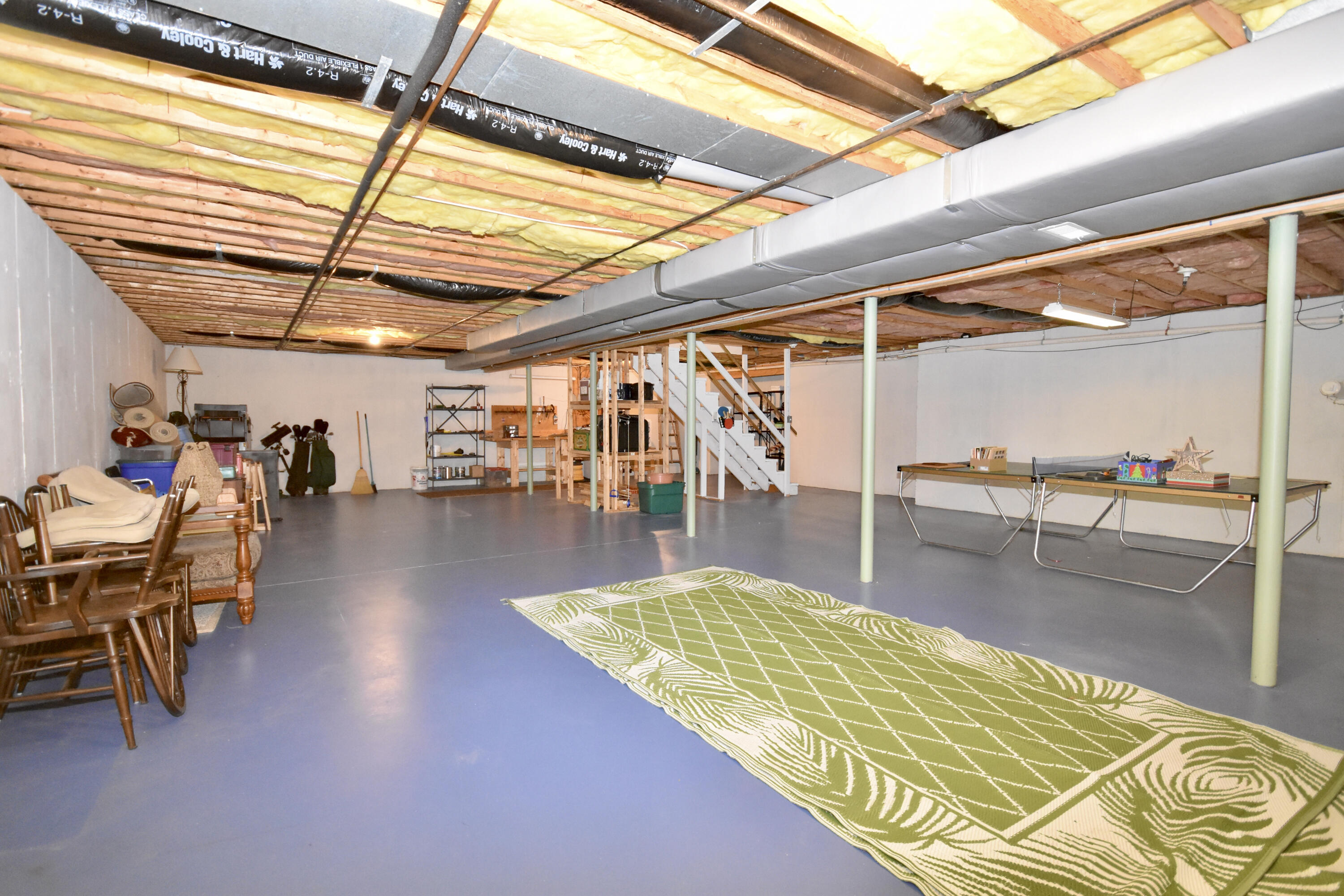 54 Snead Drive Mashpee, MA 02649 - Photo 28 of 32 a view of a swimming pool with a lounge chairs