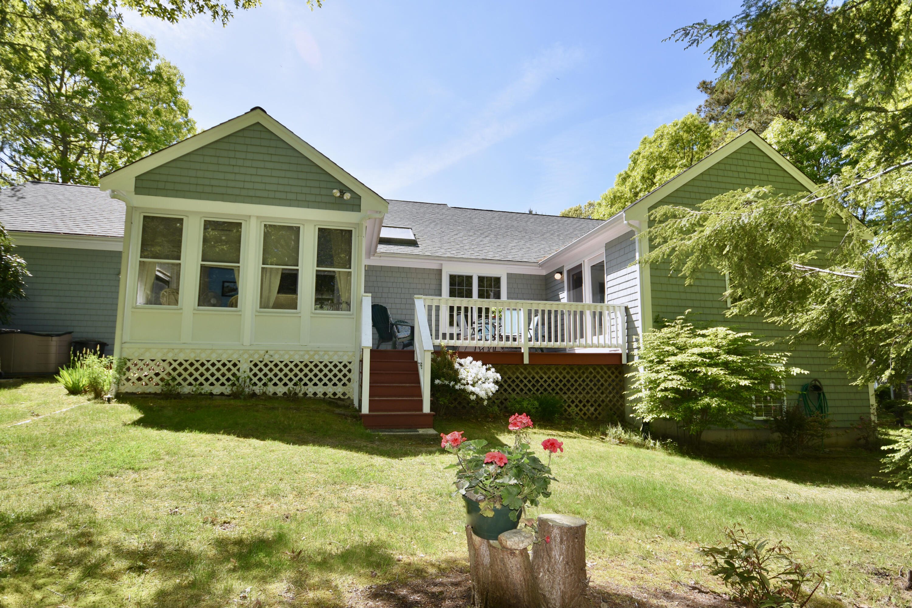 54 Snead Drive Mashpee, MA 02649 - Photo 31 of 32 a front view of a house with a yard