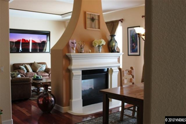 7005 Cour Street Reno, NV 89511 - Photo 4 of 9 a view of a livingroom with furniture and a fireplace