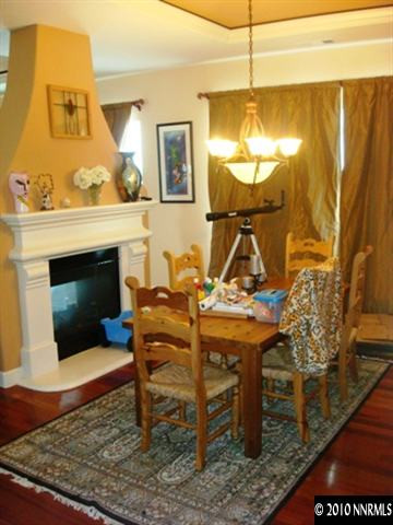 7005 Cour Street Reno, NV 89511 - Photo 5 of 9 a living room with furniture and a fireplace