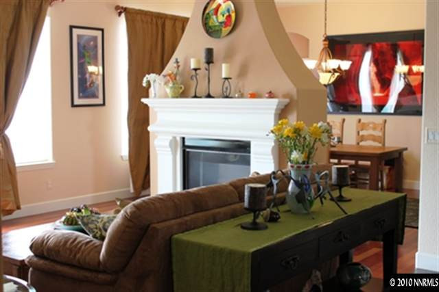 7005 Cour Street Reno, NV 89511 - Photo 6 of 9 a living room with furniture and a fireplace