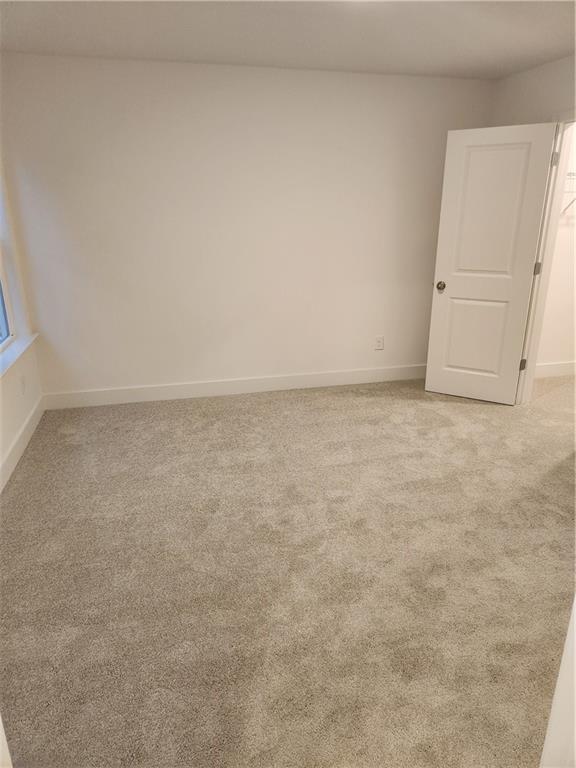 221 Brownlee Road Woodstock, GA 30188 - Photo 11 of 33 an empty room with an entryway