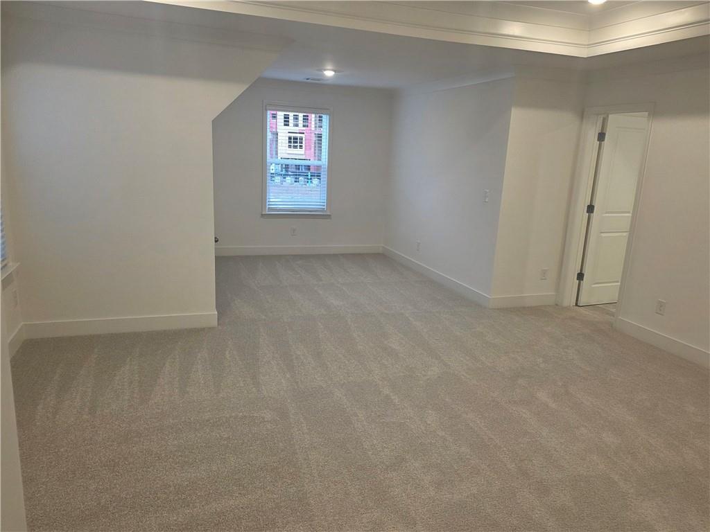221 Brownlee Road Woodstock, GA 30188 - Photo 20 of 33 a view of an empty room and a window