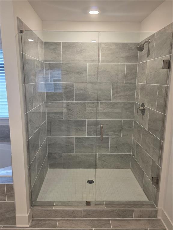 221 Brownlee Road Woodstock, GA 30188 - Photo 22 of 33 a bathroom with a shower