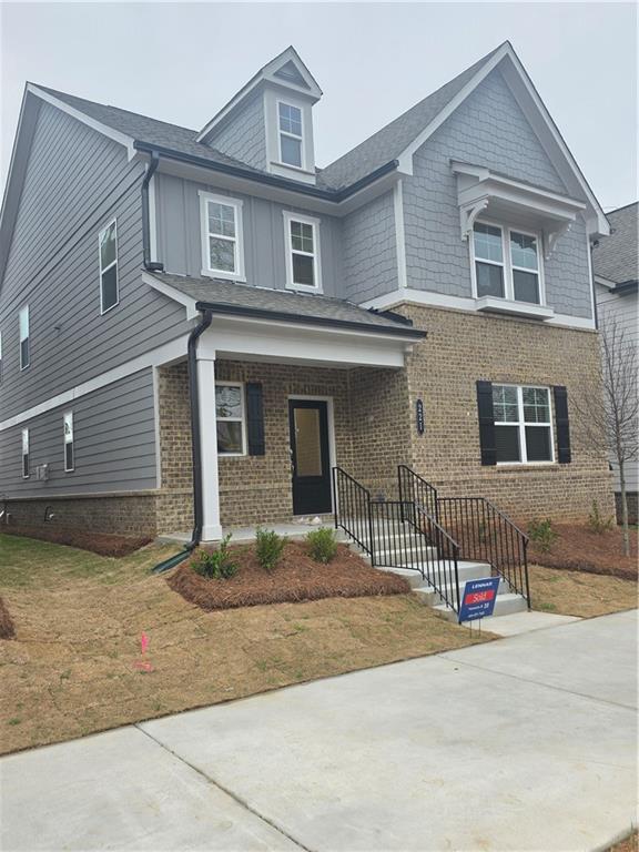 221 Brownlee Road Woodstock, GA 30188 - Photo 3 of 33 a house view with a outdoor space