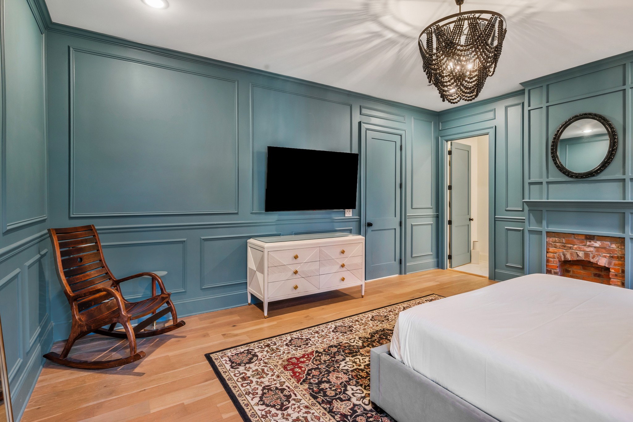 1007 Lischey Avenue Nashville, TN 37207 - Photo 20 of 52 a bedroom with furniture and a flat screen tv