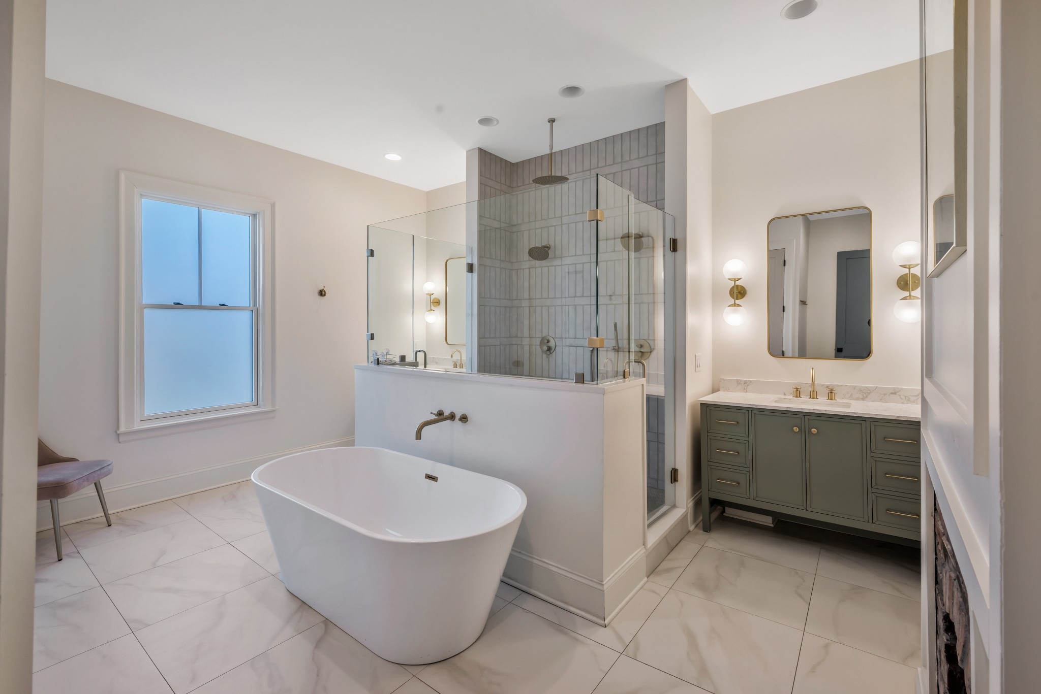 1007 Lischey Avenue Nashville, TN 37207 - Photo 23 of 52 a bathroom with a tub sink and mirror