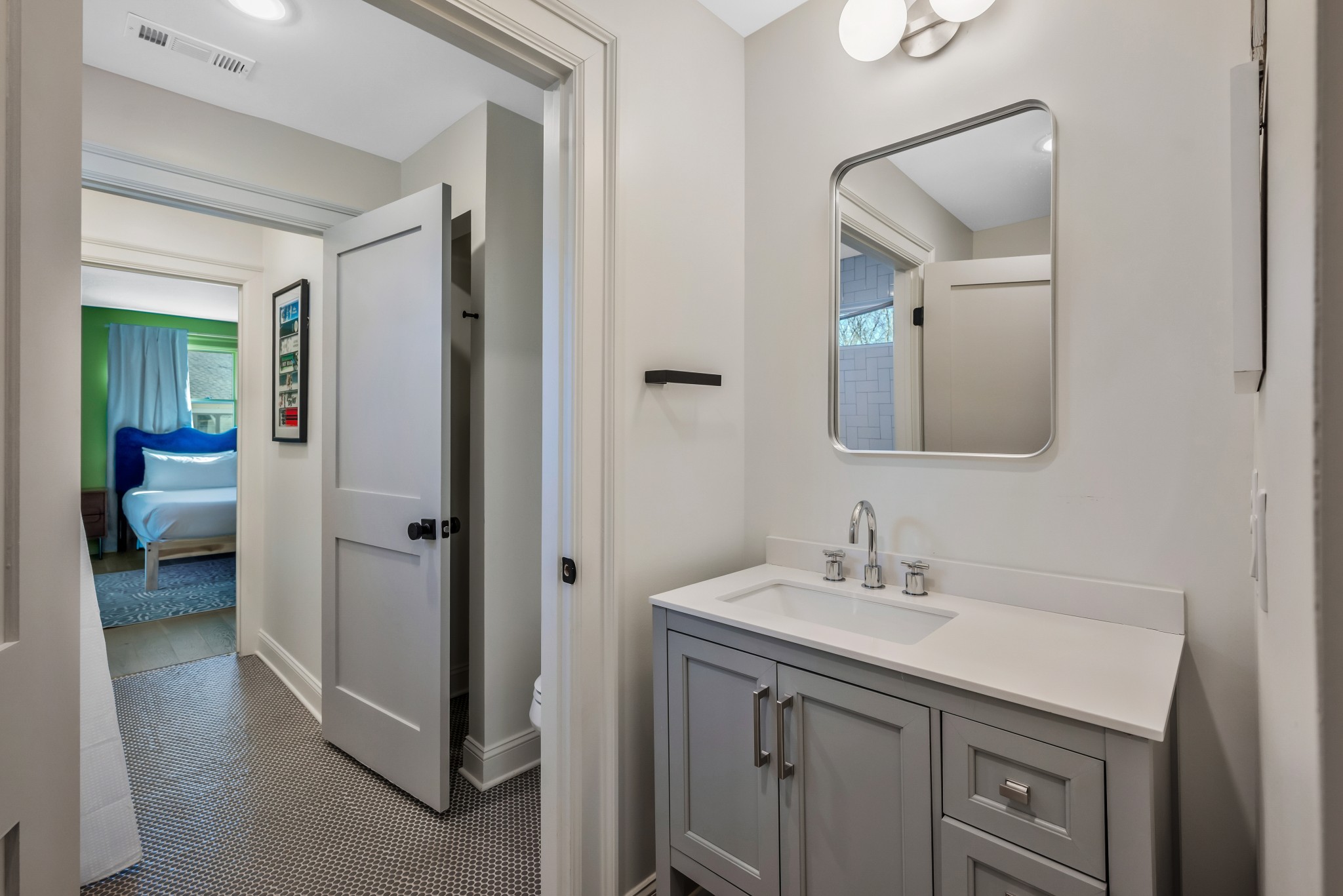 1007 Lischey Avenue Nashville, TN 37207 - Photo 34 of 52 a en suite bathroom with a toilet sink and mirror